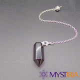 Pendule obsidienne noire taillé hexagonal sur fond noir - Mystiria